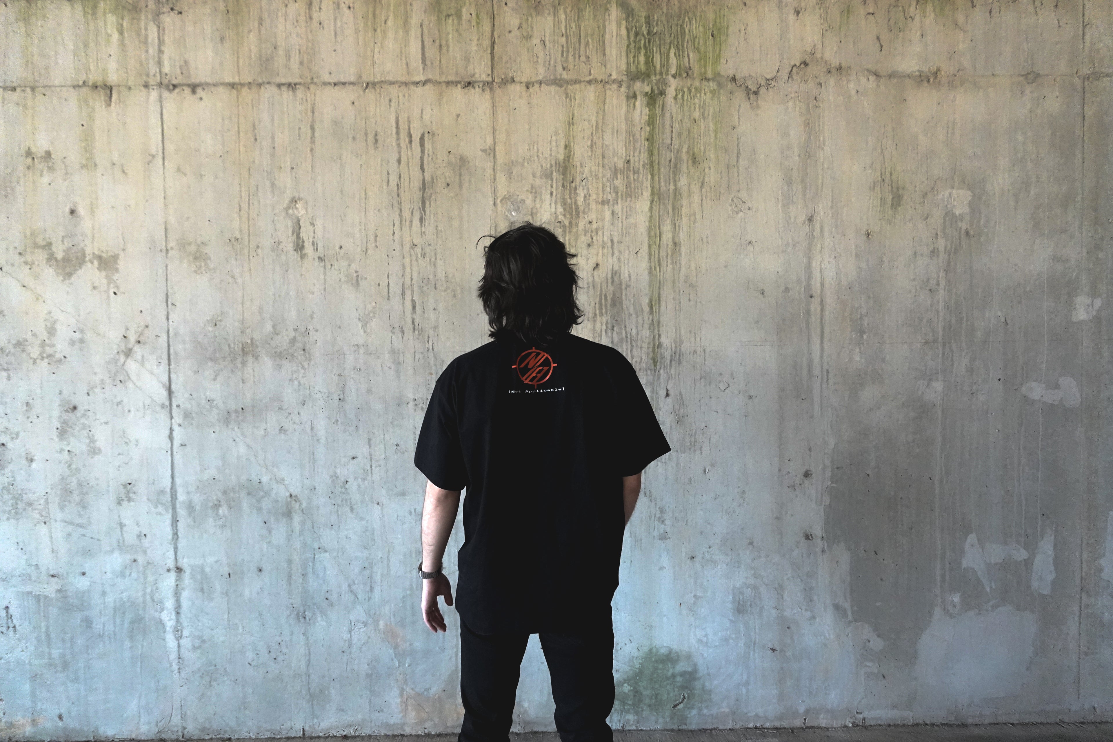 Model wearing Basic N/A Black Tee